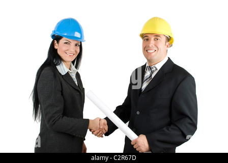 Two young architects make a deal about a project Stock Photo