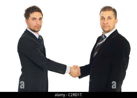 Two serious business men shaking their hands isolated on white background Stock Photo