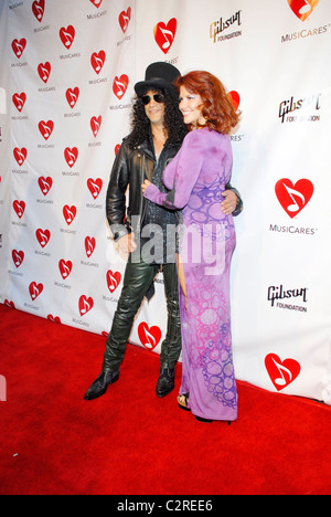 Slash and his wife The 4th Annual MusiCares MAP Fund Benefit Concert at the Henry Fonda Music Box Theatre in Hollywood Los Stock Photo