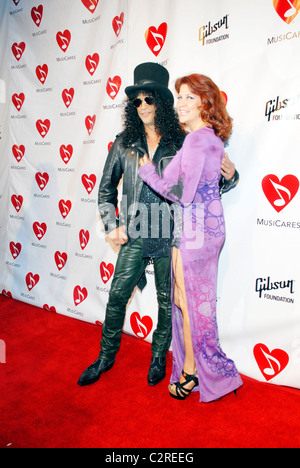 Slash and his wife The 4th Annual MusiCares MAP Fund Benefit Concert at the Henry Fonda Music Box Theatre in Hollywood Los Stock Photo