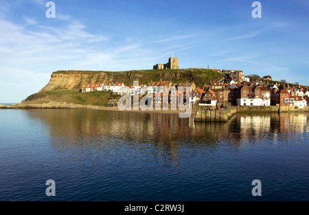 View of Whitby North Yorkshire showing the harbour , St Marys church on top of the hill and Tate Hill pier. Stock Photo