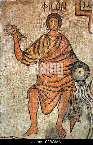 Roman or Byzantine floor mosaic of a man named Philon holding a fish and a water vessel, National Museum of Aleppo, Syria. Stock Photo