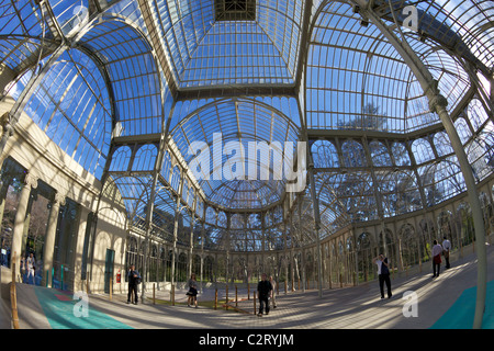 Visitors and tourists admire the Palacio de Cristal, Crystal Palace, Parque del Retiro, Retiro Park, Madrid, Spain, Europe, EU Stock Photo
