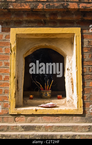 Vertical view of one of the ten shrines in the courtyard at Tran Quoc Pagoda the oldest Buddhist temple in Hanoi. Stock Photo