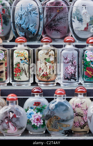 Collection of beautifully inside painted small glass snuff bottles, Beijing, Panjiayuan Market, Beijing, China Stock Photo