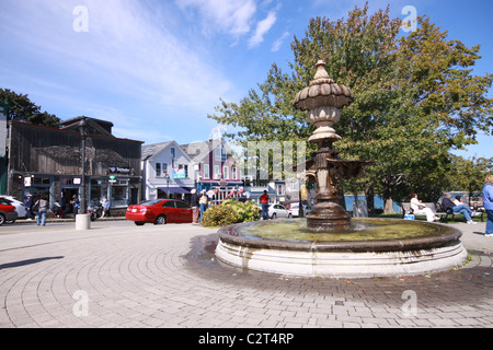 Fountain splashes along the harbor walk in Bar Harbor Park, Maine. Stock Photo