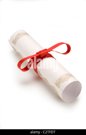 Diploma wrapped in red ribbon on white Stock Photo