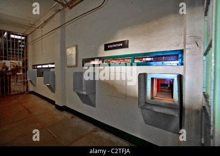 Prisoner visitation windows at the former Alcatraz Federal Prison in San Francisco Bay, CA. It is now a tourist attraction. Stock Photo