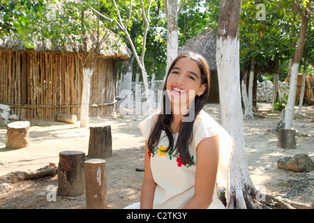 Mexican indian Mayan latin girl in jungle cabin house Mexico Stock Photo