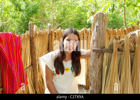 Mexican indian Mayan latin girl in jungle cabin house Mexico Stock Photo