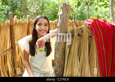 Mexican indian Mayan latin girl in jungle cabin house Mexico Stock Photo