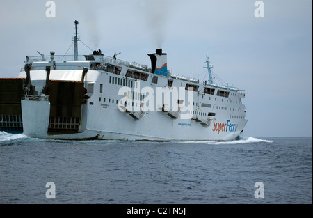 Philippine Super Ferry transports passengers across the seas off Puerto Galera, Mindoro, Philippines. Stock Photo