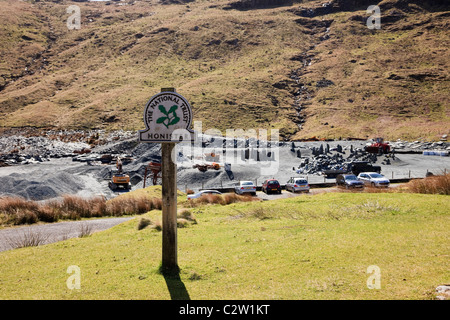 Sign by slate mine at the top of the pass in the Lake District National Park. Honister Pass, Cumbria, England, UK, Britain. Stock Photo