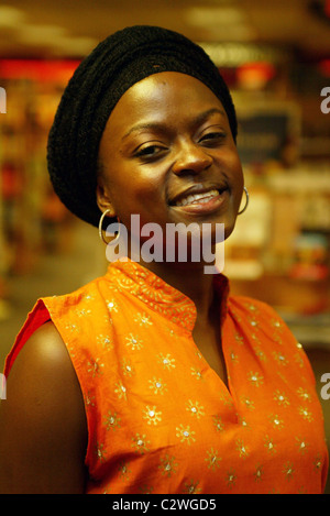 Ugandan singer Omega Bugembe Okello performs and signs copies of her new CD 'Kiwomera Emmeeme' at Borders Dupont Circle Stock Photo