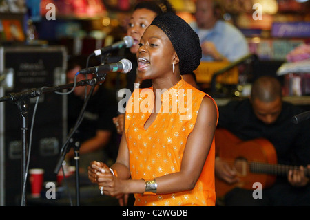 Ugandan singer Omega Bugembe Okello performs and signs copies of her new CD 'Kiwomera Emmeeme' at Borders Dupont Circle Stock Photo