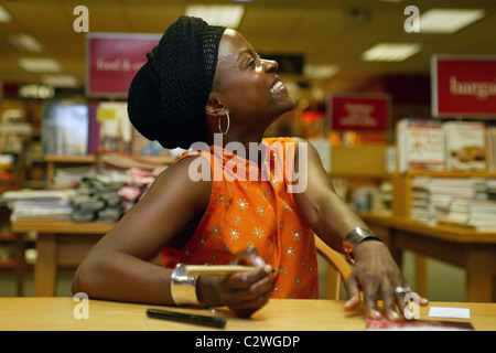 Ugandan singer Omega Bugembe Okello performs and signs copies of her new CD 'Kiwomera Emmeeme' at Borders Dupont Circle Stock Photo