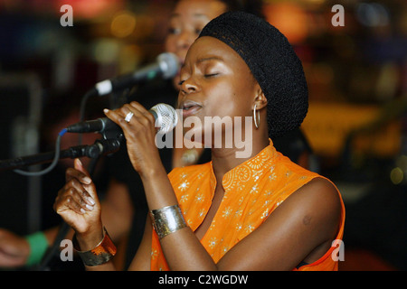 Ugandan singer Omega Bugembe Okello performs and signs copies of her new CD 'Kiwomera Emmeeme' at Borders Dupont Circle Stock Photo