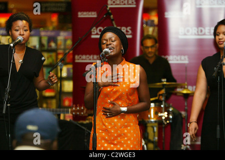 Ugandan singer Omega Bugembe Okello performs and signs copies of her new CD 'Kiwomera Emmeeme' at Borders Dupont Circle Stock Photo