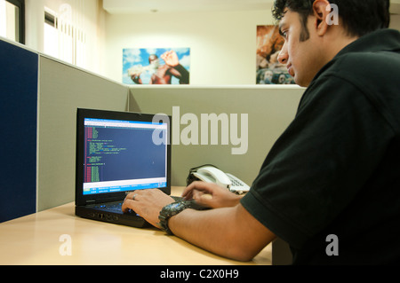 Software programmer at work in office Stock Photo