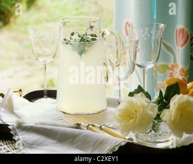 A detail of a glass jug filled with homemade lemonade Stock Photo