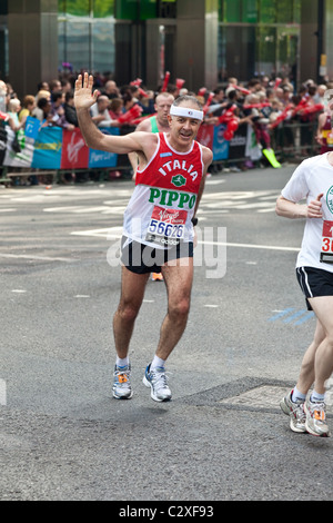 Fancy dress runners on the London Marathon 2011 at Canary Wharf, Docklands, London, England, United Kingdom. Stock Photo
