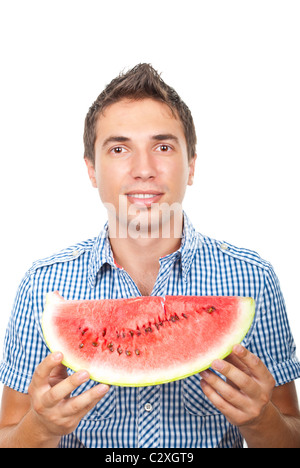 Smiling Young man showing a slice of watermelon isolated on white background Stock Photo