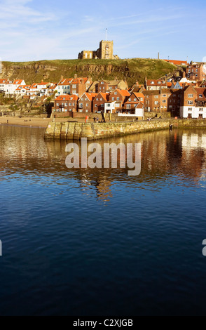 View of Whitby North Yorkshire showing the harbour , St Marys church on top of the hill and Tate Hill pier. Stock Photo