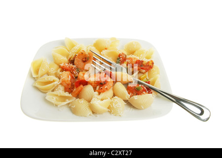 Pasta and prawns with a fork on a plate Stock Photo