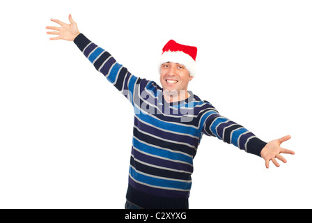 Happy smiling man wearing santa hat and standing with arms open ready for hug isolated on white background Stock Photo