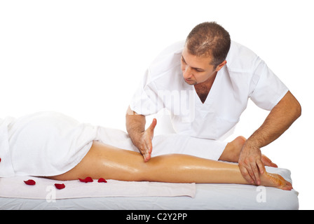 Real masseur give friction massage type to woman's leg Stock Photo