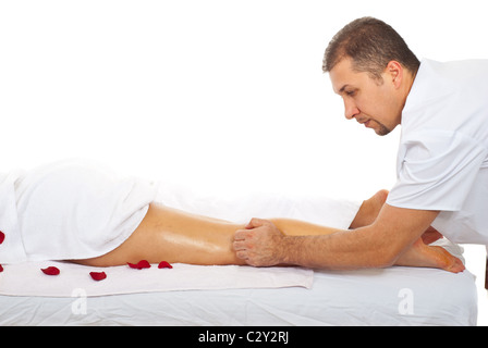 Health worker man giving anti cellulite massage to a woman legs Stock Photo