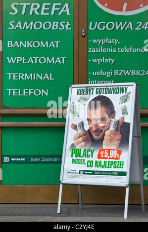 Actor Antonio Banderas surrounded by zloty bank notes in advertising poster for Bank Zachodni WBK in Wrocław, Silesia, Poland Stock Photo