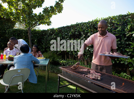 Man braaing boerewors sausage, Johannesburg, South Africa Stock Photo ...