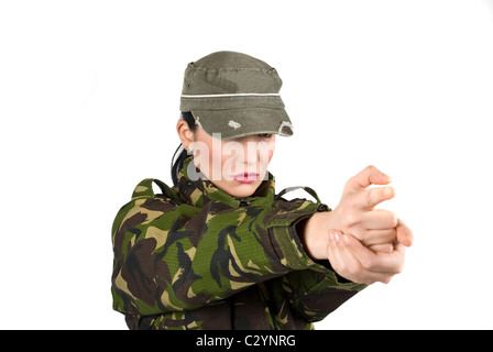 Army soldier gesturing with hands like he shoot with a gun isolated on white background Stock Photo
