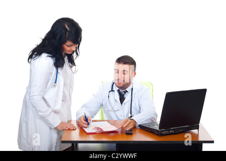 Two physicians team working in a medical office isolated on white background Stock Photo
