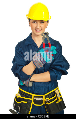 Worker woman with helmet holding pincers isolated on white background Stock Photo