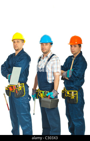 Team of constructors workers standing in a row and holding tools isolated on white background Stock Photo