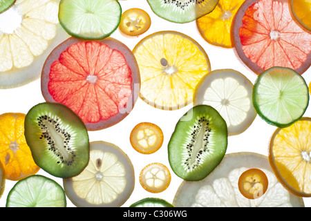 Back projected citrus slices. Stock Photo