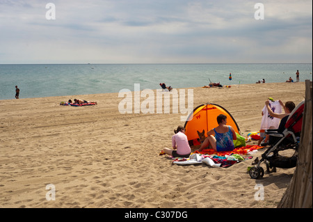 Canet-en-Roussillon, France, Tourist Families Relaxing on Mediterranean Ocean Beach near Perpignan,  camping holiday france family Stock Photo