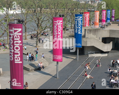 A view of a line of colourful banners in a line outside the National Theatre in the Southbank London Stock Photo