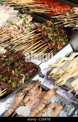 Street vendor kebabs on Jalan Sultan in Chinatown in Kuala Lumpur Stock Photo