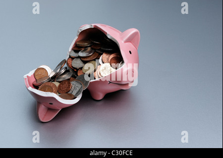 Broken piggy bank Stock Photo