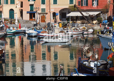 detail of the small port in Camogli with the characteristic fishing boats Stock Photo