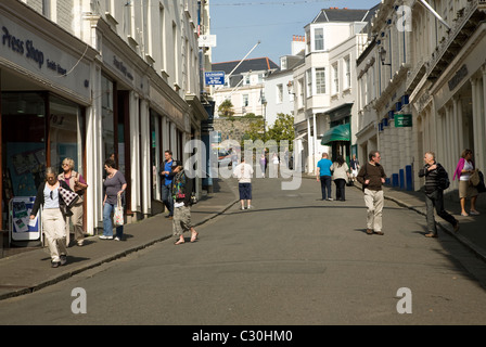 Pedestrians walk shopping street St Peter Port Guernsey Channel Islands Stock Photo