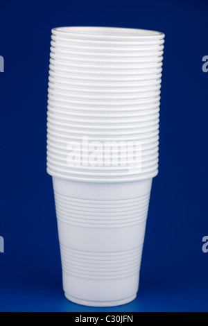 Twenty five white plastic disposable drinking cups Stock Photo