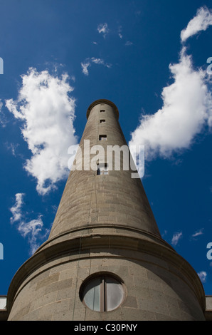 Lighthouse. Blue sky with clouds. Bottom view of the lighthouse Stock ...