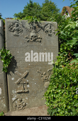 'Telling gravestone' in the cemetery of the village church at Nieblum on the North Frisian island of Amrum in Schleswig-Holstein Stock Photo