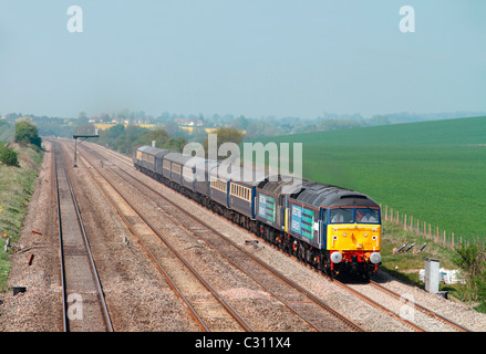 A pair of class 47 diesel locomotives numbers 47810 and 47501 working a Cruise Saver Express charter near Cholsey on 19th April 2011.