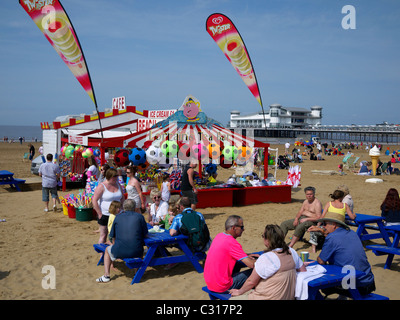 Tea bar on Clifton sands with the newly developed pier in the background Weston-Super-Mare North Somerset UK Stock Photo