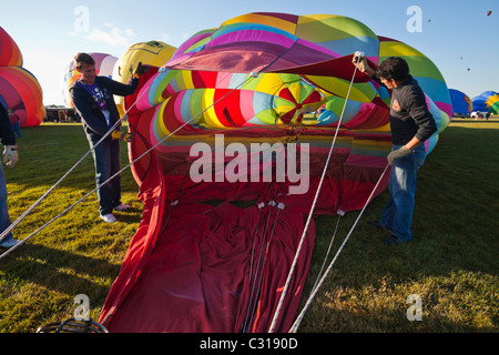 man inside hot air balloon as it inflates Stock Photo: 52266644 - Alamy